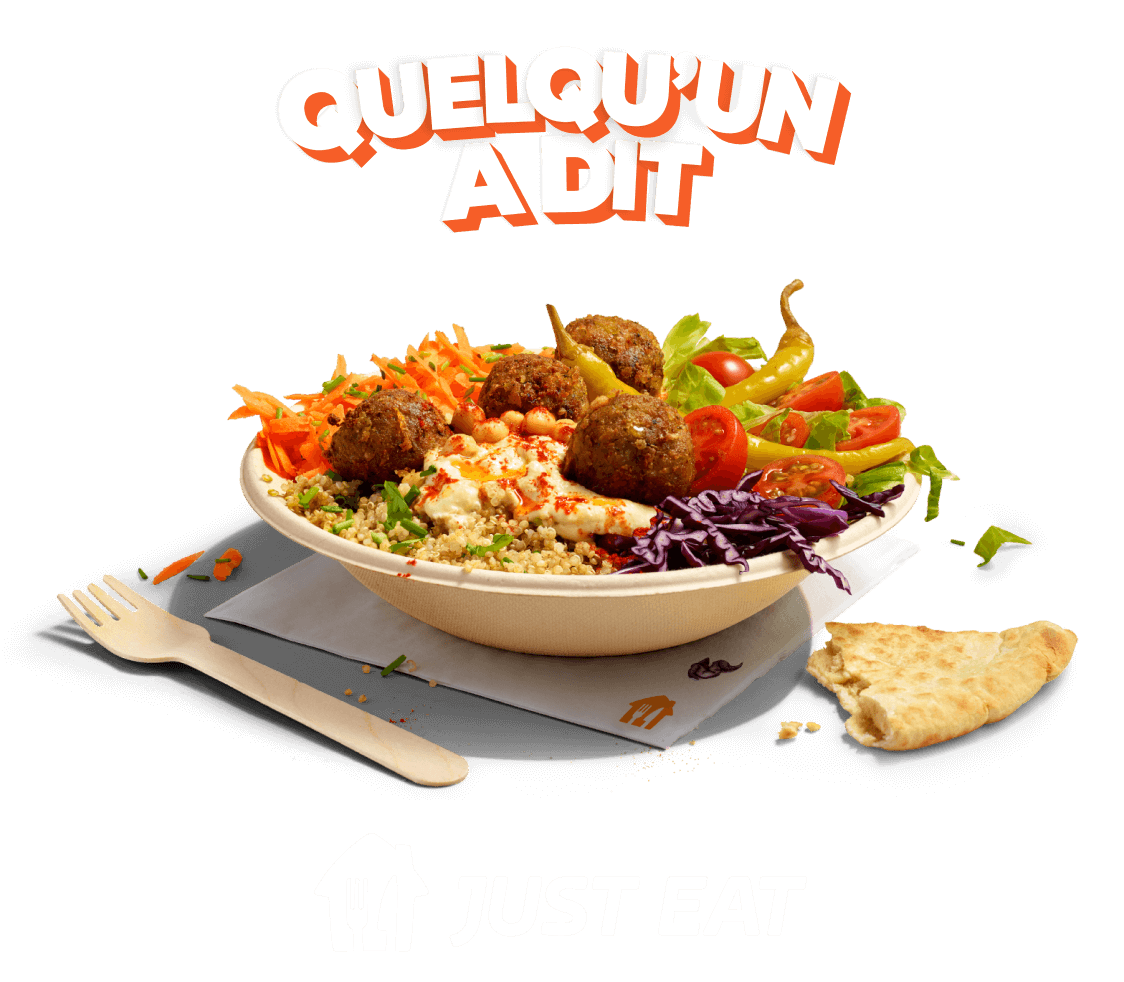 Image sur fond orange représentant l’accroche Quelqu'un a dit au-dessus d’un bol de falafels et de légumes, et en dessous, le logo JUST EAT.